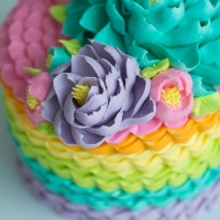 Signature rainbow ruffle cake